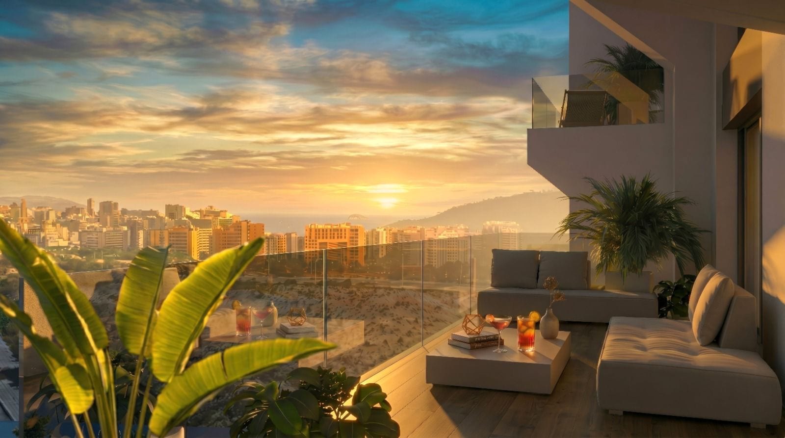 Infografía 3D de una terraza privada al atardecer, con sofá, vegetación y vistas a la costa y a la ciudad
